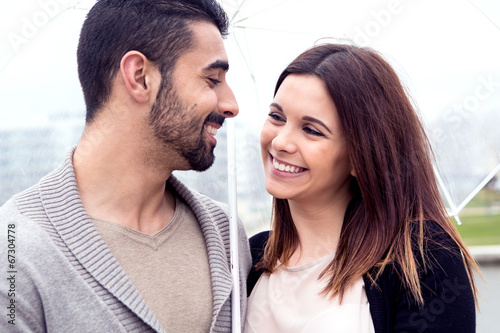 Couple under umbrella