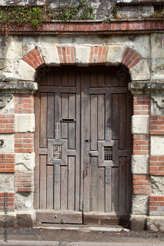 ancient brown wooden door photo