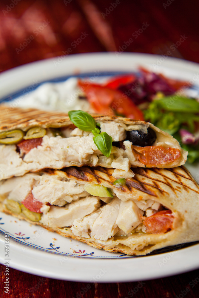 Wrap tortilla chicken olives basil salad tomato