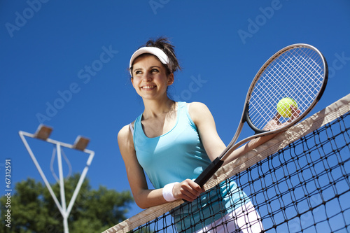 Young woman tennis player on the court  © Sebastian Duda