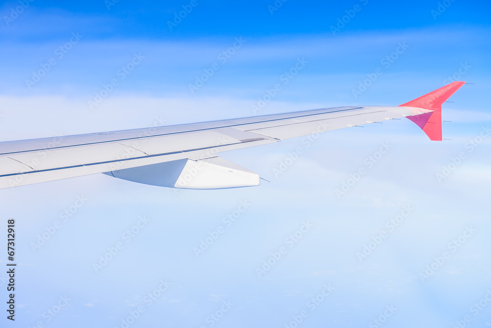 Looking through window aircraft during flight in wing with a nic Looking through window aircraft during flight in wing with a nic