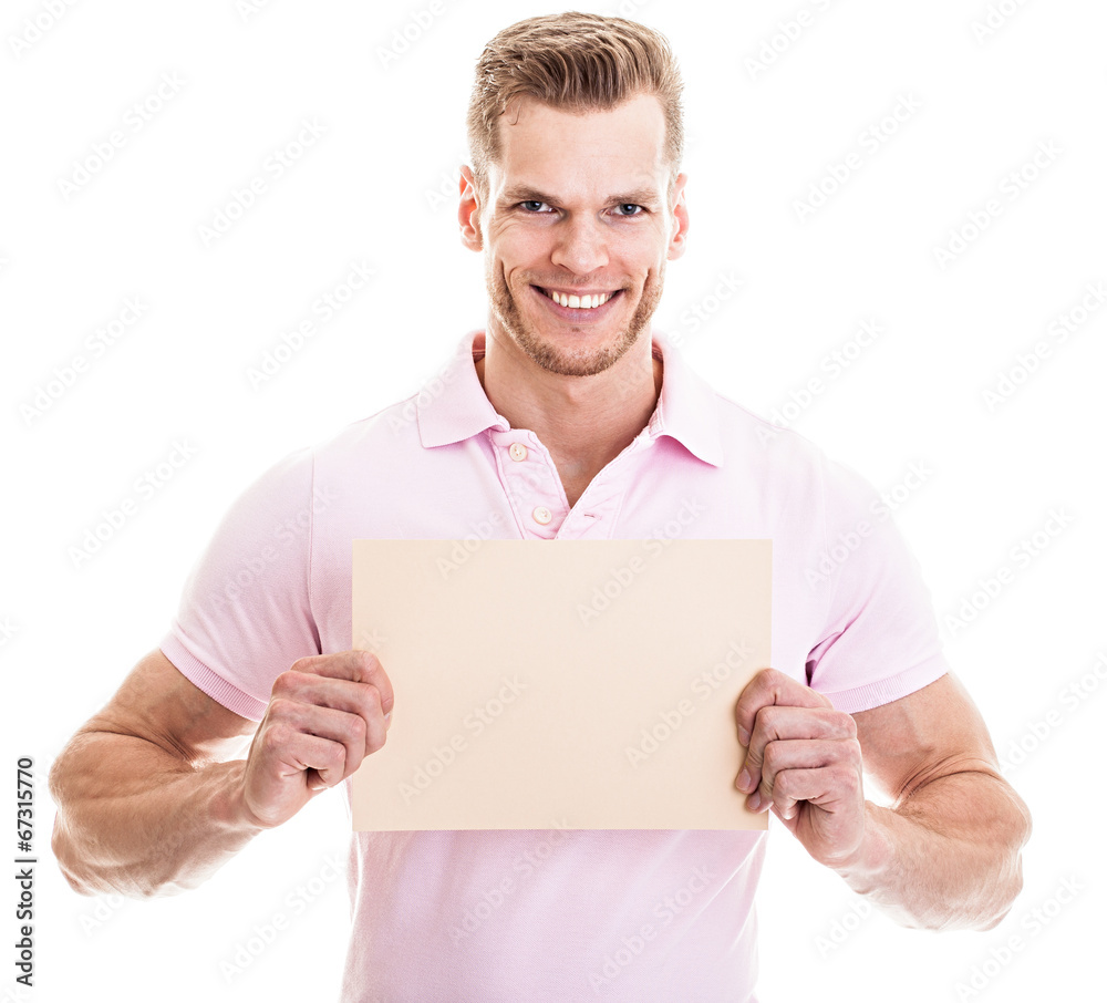 Junger Mann hält Schild - freigestellt vor weißem Hintergrund Junger Mann hält Schild - freigestellt vor weißem Hintergrund