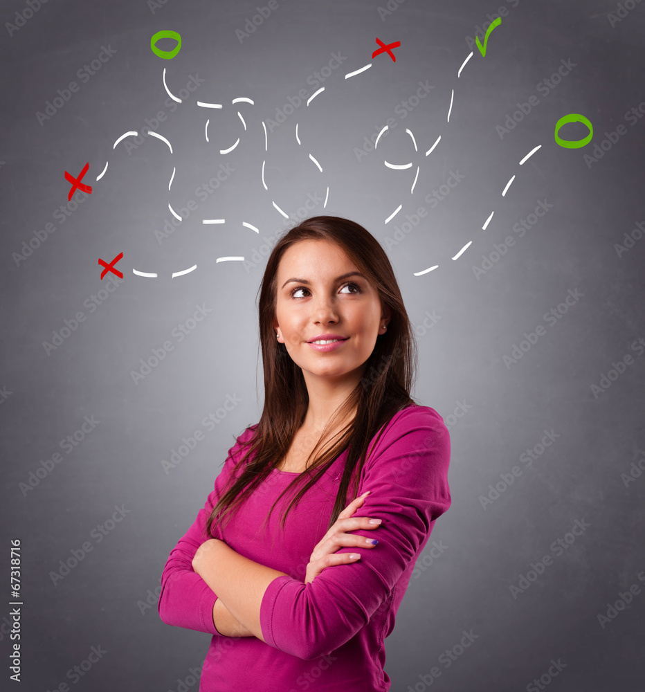 Young woman thinking with abstract marks overhead Young woman thinking with abstract marks overhead