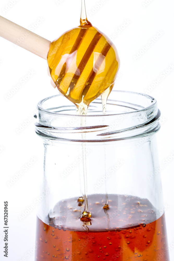 Pure Honey diping and dipper isolated - obrazy, fototapety, plakaty 