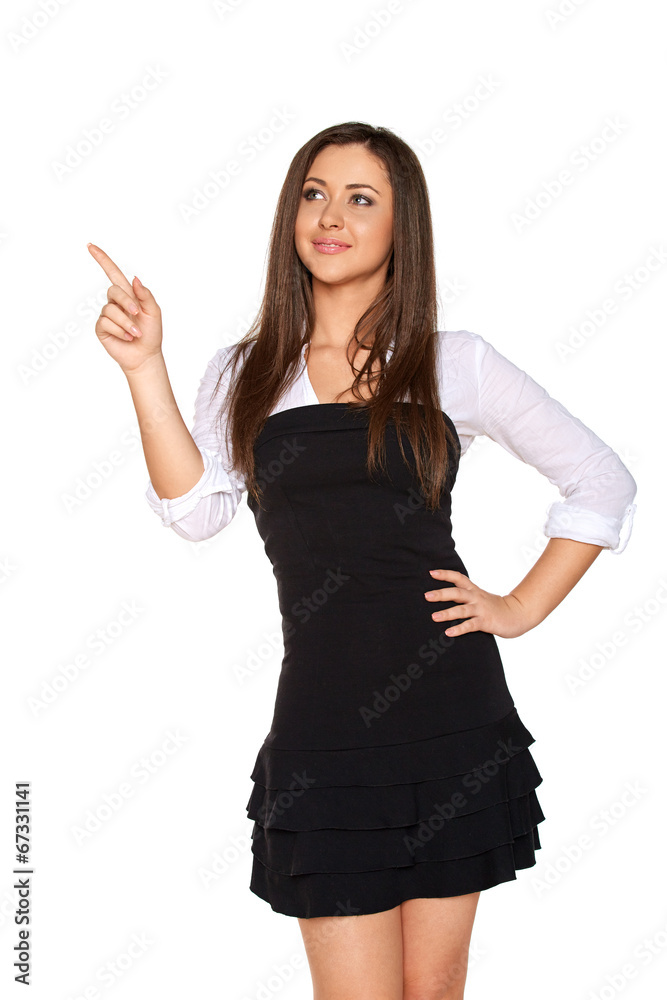 Woman pointing up showing copy space, isolated on white