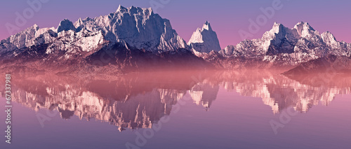 Snow peaks mountain landscape with misty lake at sunrise. Panora
