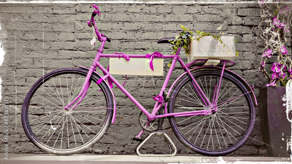 vintage bicycle against old brick wall
