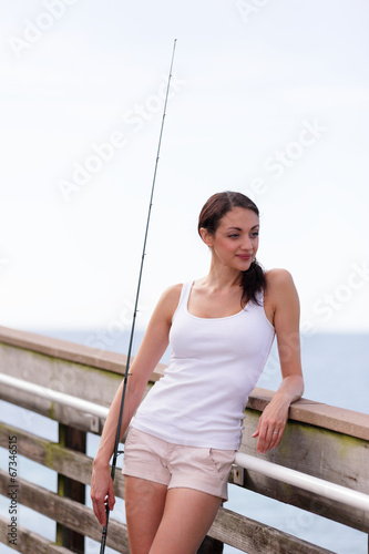 Woman holding a fishing pole