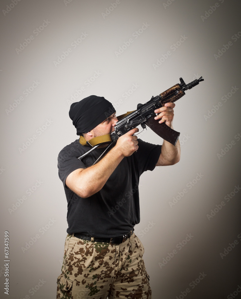 Man with gun Man with gun