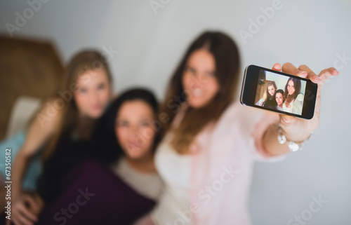 Three friends having a selfie togehter