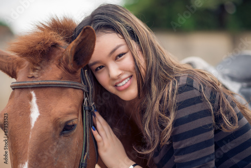 Asian girl and pony