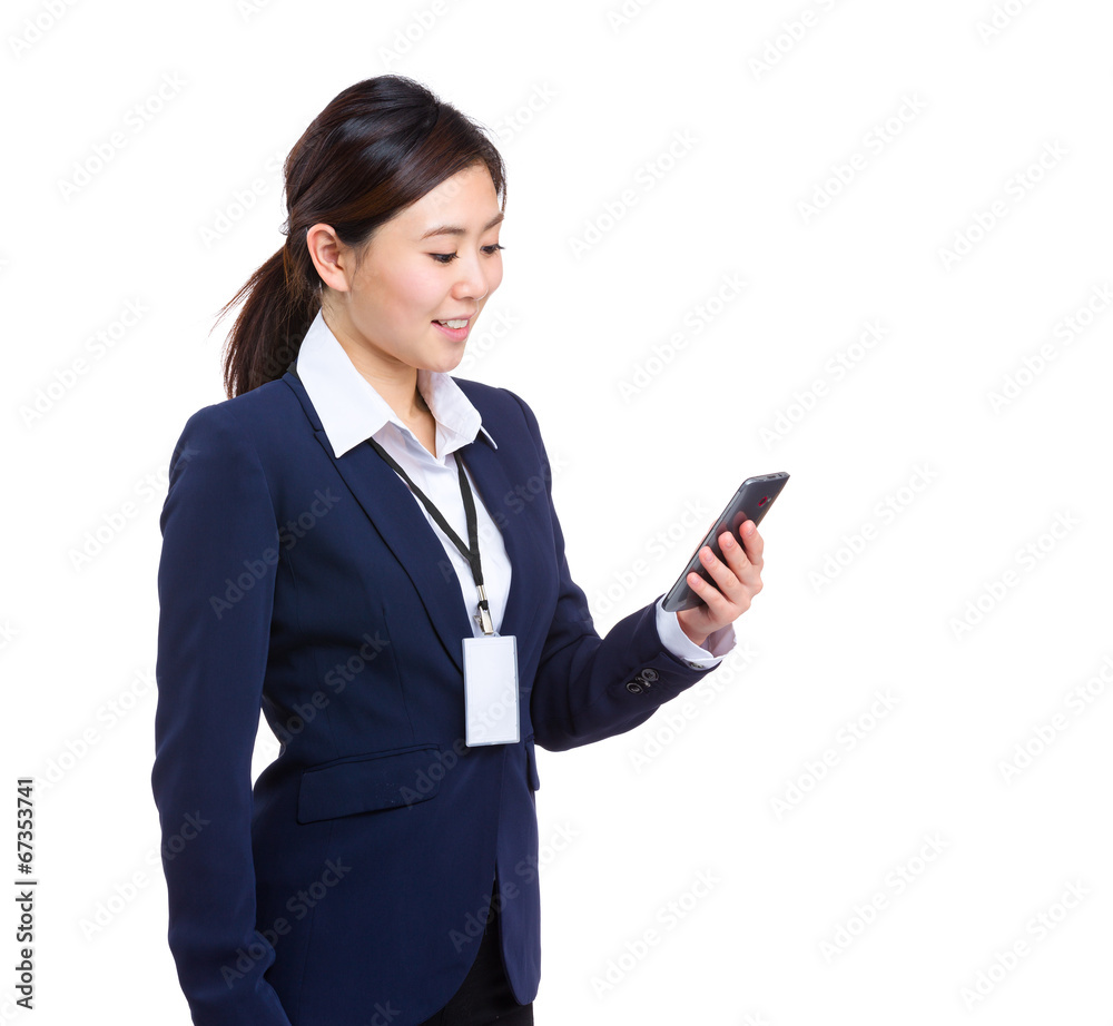 Business woman look at mobile phone Business woman look at mobile phone