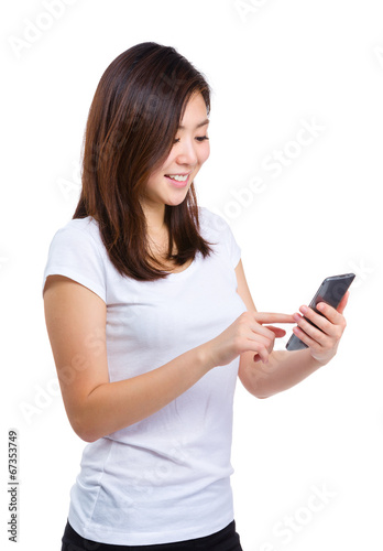 Woman touch mobile phone screen © leungchopan