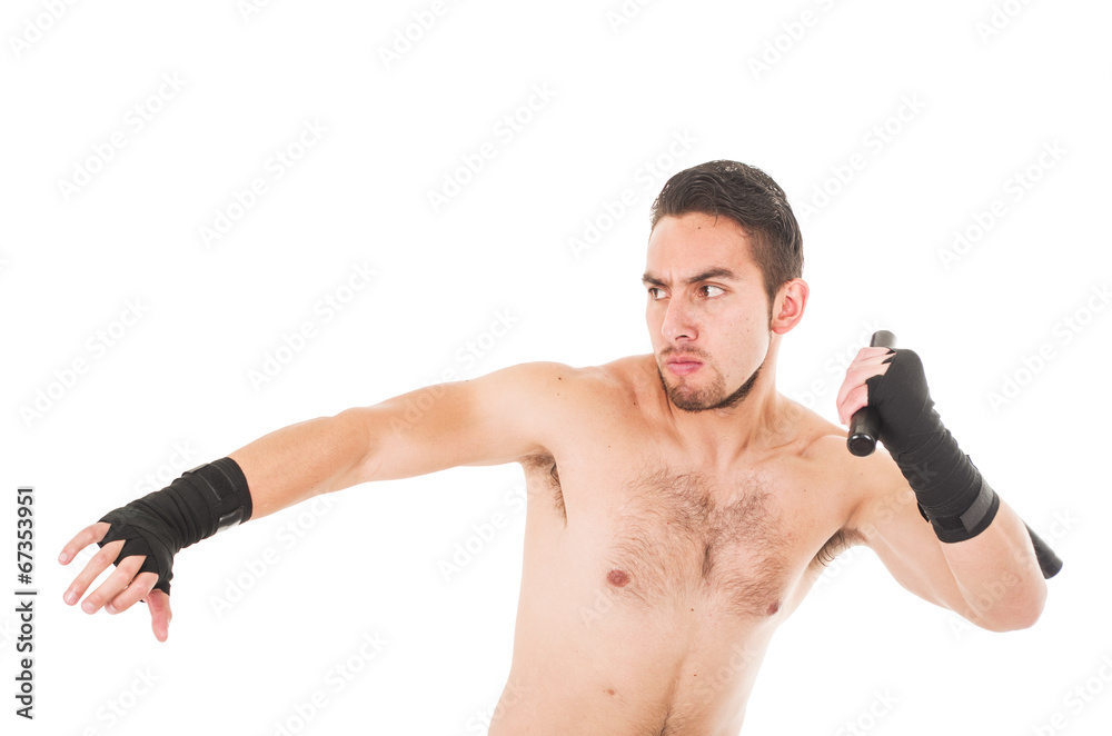 Fototapeta premium tough martial arts fighter wearing black shorts and wristband