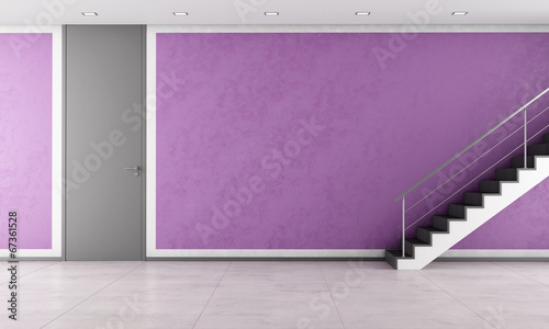 Staircase in a empty purple lounge © archideaphoto