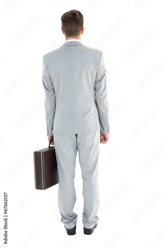 Businessman holding his briefcase Businessman holding his briefcase