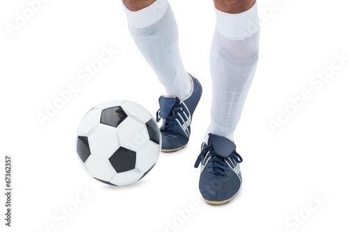 Football player kicking the ball