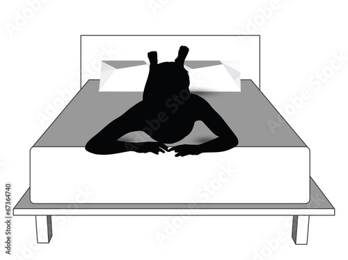 silhouette of a man in bed