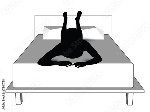silhouette of a man in bed