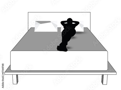 silhouette of a man in bed