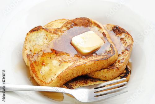 French Toast Served with Syrup and Butter