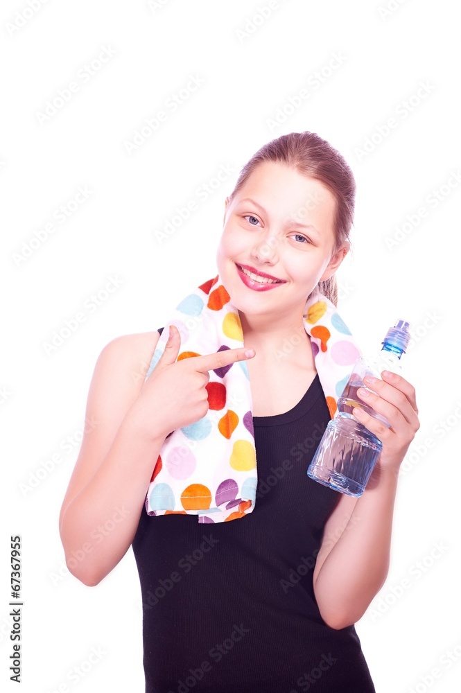 Teen girl holding towel and bottle of water Teen girl holding towel and bottle of water