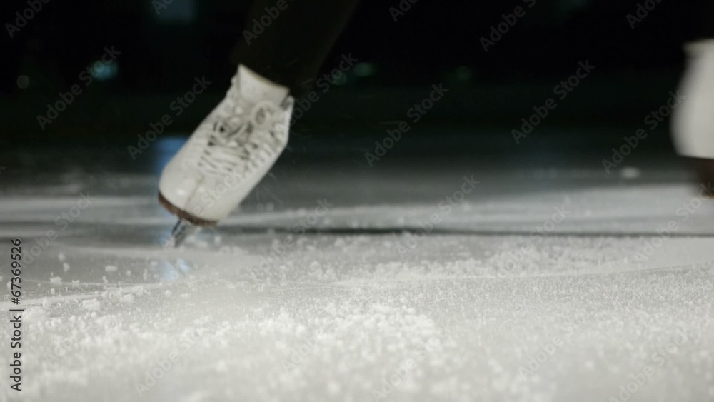 figure skating white skates stopping