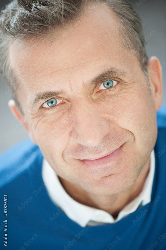 Vertical portrait of handsome mature man