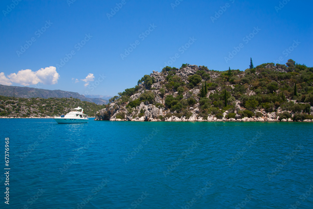 Bay in mediterranean sea with yacht in the Kekova