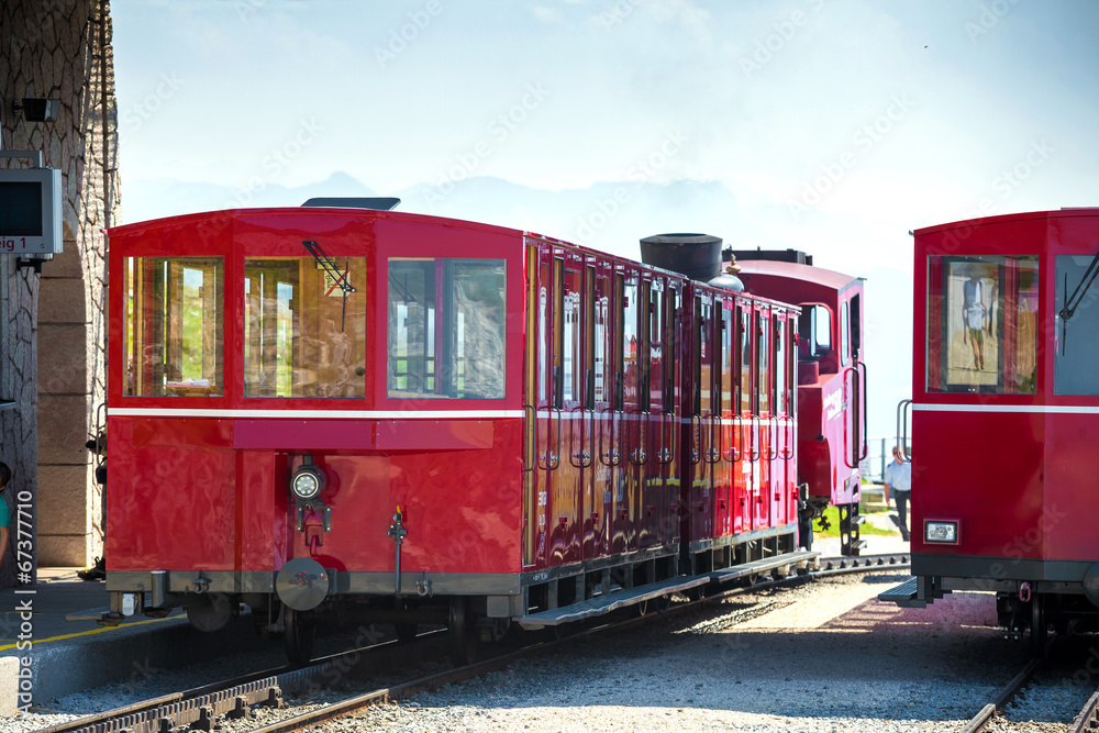 Obraz premium Steam trainn railway carriage going to Schafberg Peak