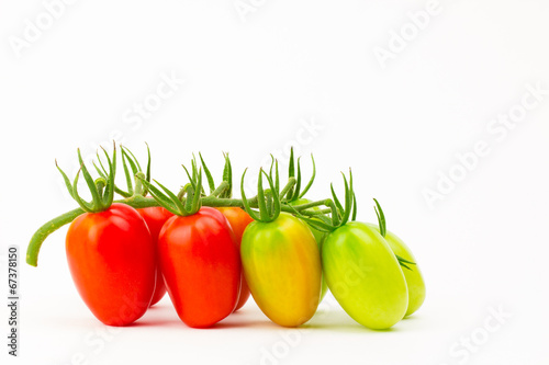 Grape tomatoes ripening on stem