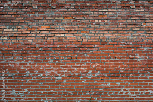Red Cracked white grunge brick wall textured background stained