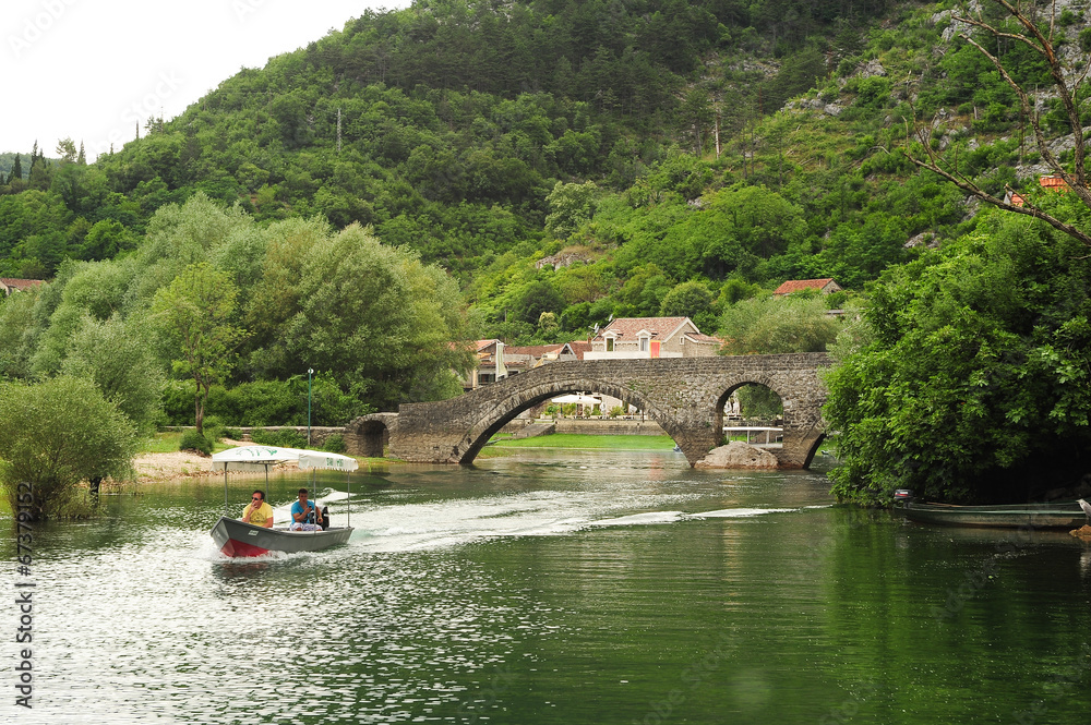 Tourists visiting lake Skadar national park on a boat