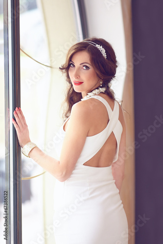 portrait of beautiful bride. wedding dress and hairstyle © Olesia Bilkei