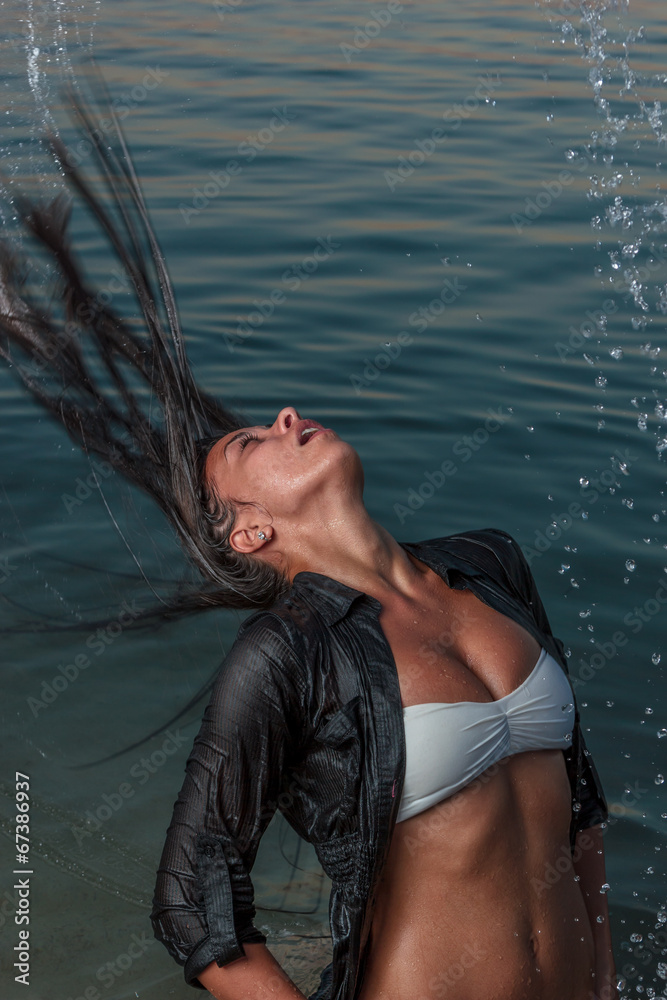 Fototapeta premium Beautiful woman on the beach.