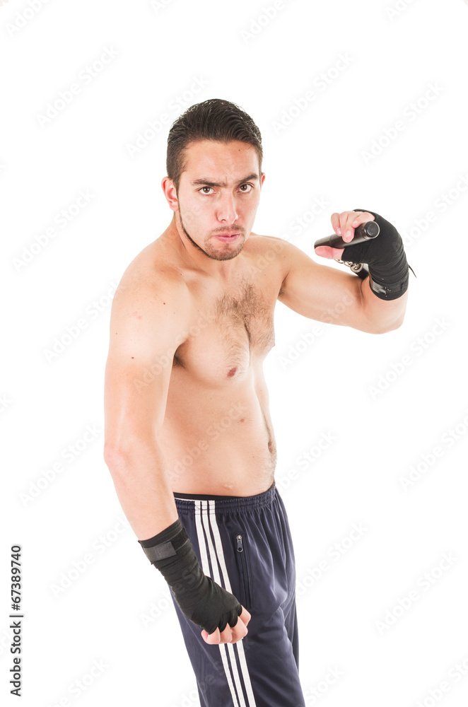 tough martial arts fighter wearing black shorts and wristband