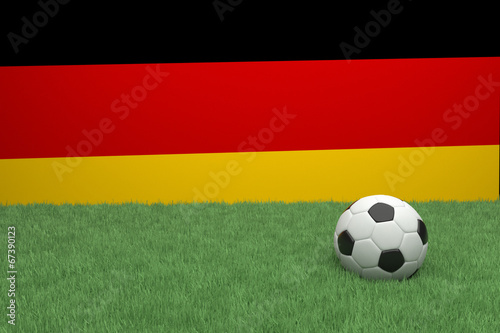Realistic 3d rendering of a football in front of the flag of Germany