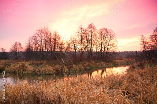 sunrise over the river late autumn