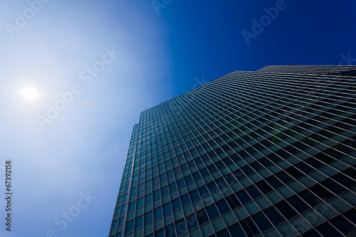 Skyscrapers view with blue sky .  office buildings. modern glass