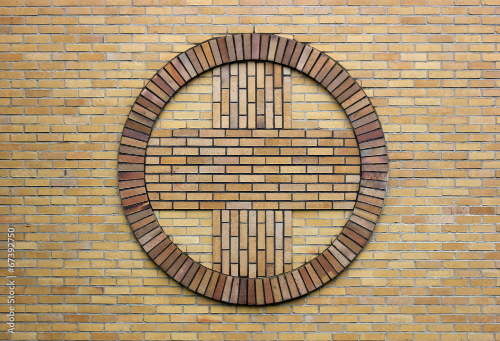 Cross symbol on a church wall Cross symbol on a church wall