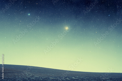 field at night. Elements of this image furnished by NASA