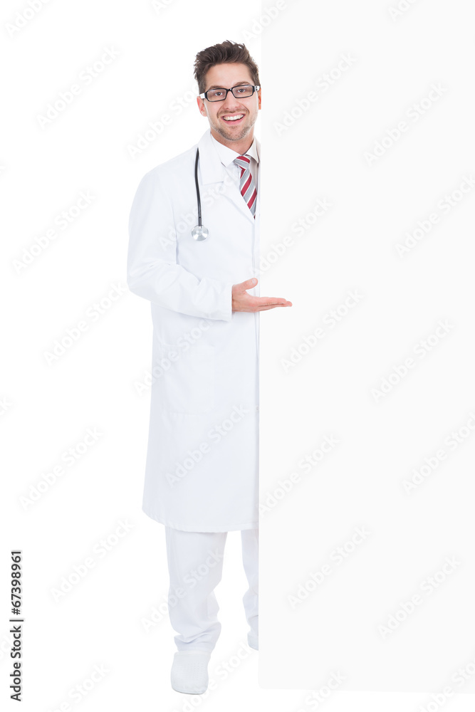Happy Male Doctor Displaying Billboard Happy Male Doctor Displaying Billboard