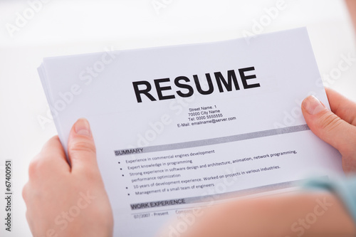 Woman Holding Resume