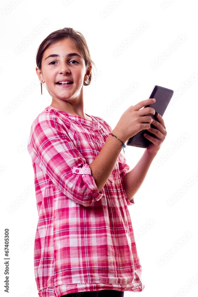 smiling little girl with a tablet smiling little girl with a tablet