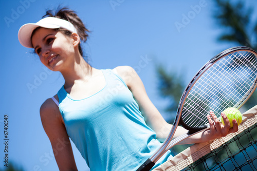Female playing tennis © BrunoWeltmann