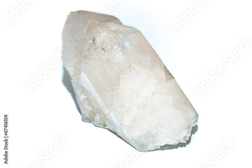 Large double pointed clear quartz crystal over white