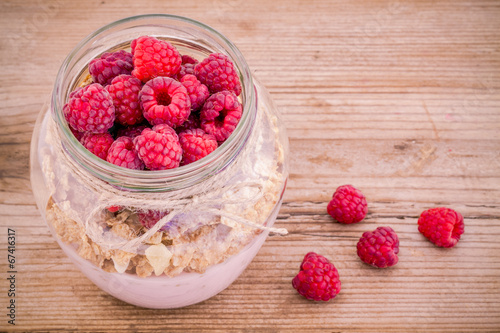 Breakfast: cereal with raspberries and yogurt