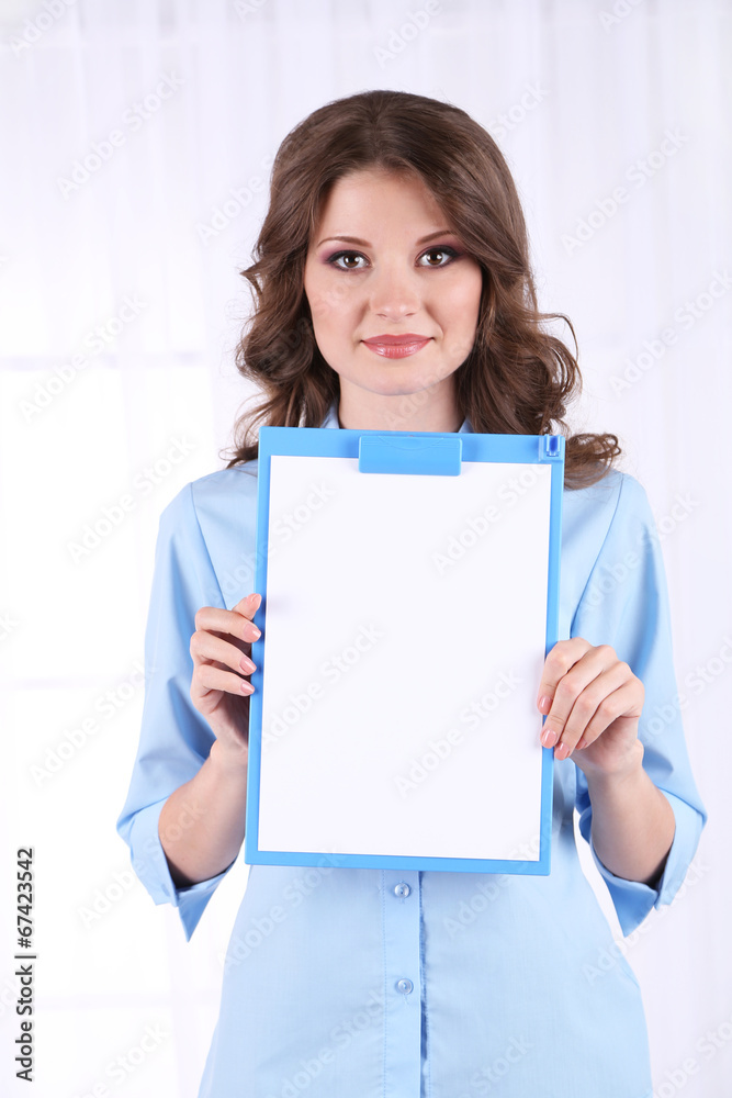 Young business woman in room Young business woman in room