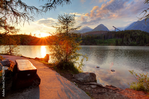 Fototapeta Naklejka Na Ścianę i Meble -  Mountain lake in Slovakia at sunset - Strbske pleso