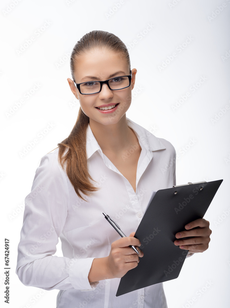 Young woman secretary at work at the office Young woman secretary at work at the office